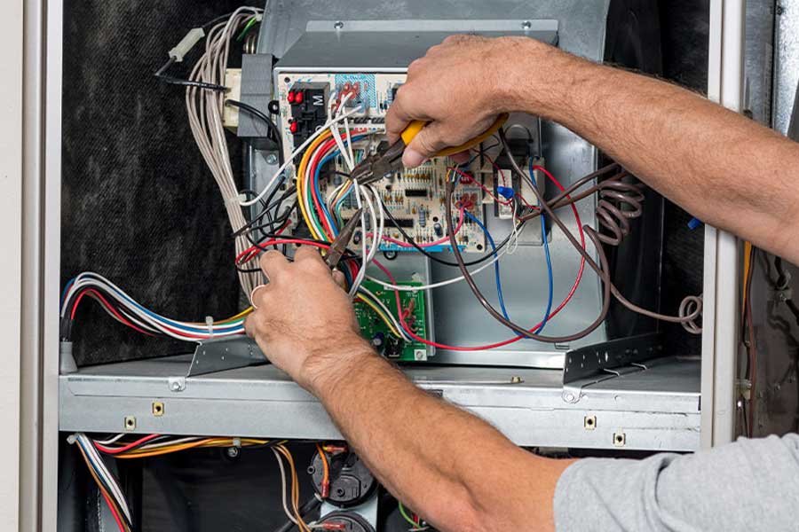 Furnace maintenance in Elgin checking electrical connections
